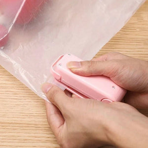 Hand pressure heat sealing machine